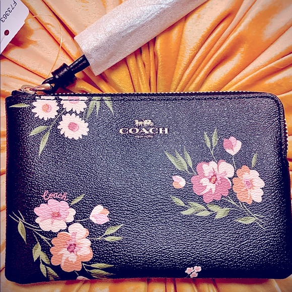 Coach | “Daisies” zipper Wristlets - Picture 2 of 8